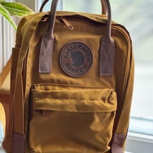 Kånken mustard backpack